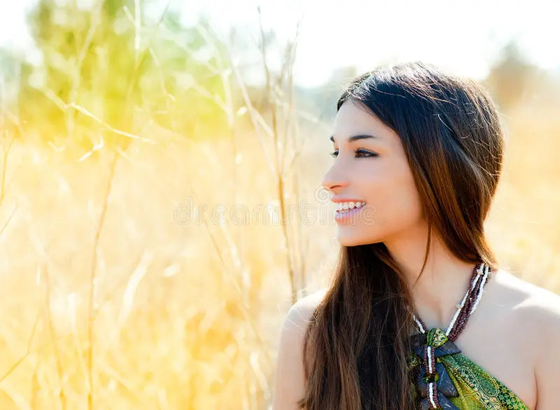 files/asian-indian-woman-profile-golden-field-24319743.webp